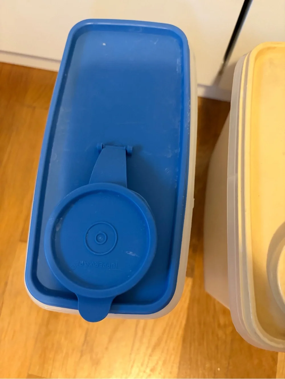 Set of two Tupperware cereal containers blue and tan lids